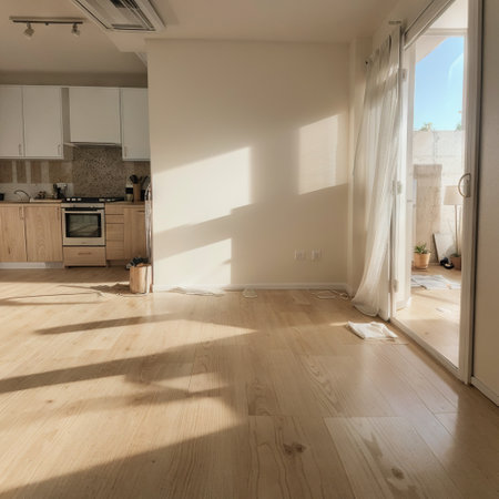 ing picture of an empty living room with sunlight shine through a sliding door wooden floor white wall Renovate New house Homの素材