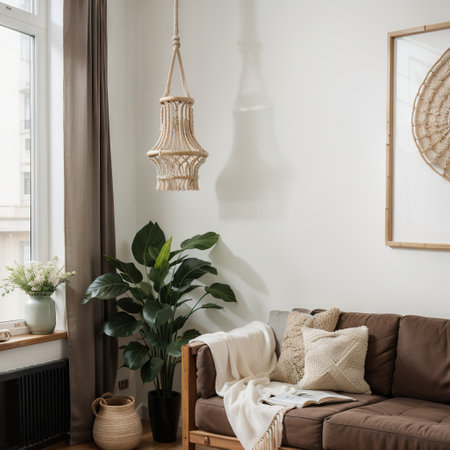 Stylish and modern boho interior of living room with flowers in vase wooden desk beige macrame books and elegant accessories Dの素材