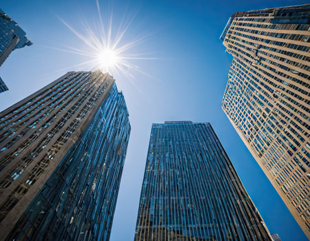 Low angle view of skyscrapers in Manhattan, New York City.の素材