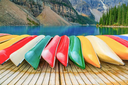 Kayaks on Moraine lake in Banff National Parkの写真素材