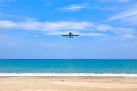 Landing  plane on the tropical ocean coast