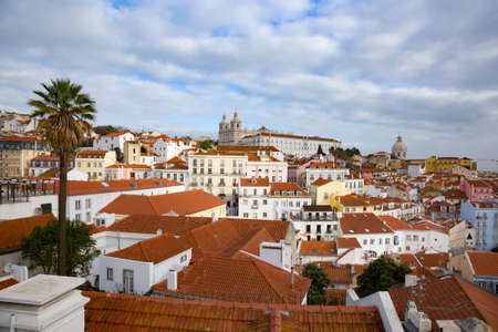 Sao Vicente de Fora Monastery and dome of the National Pantheon seen from Portas do Sol Belvedere with Alfama District rooftops. Lisbon, Portugal.の写真素材
