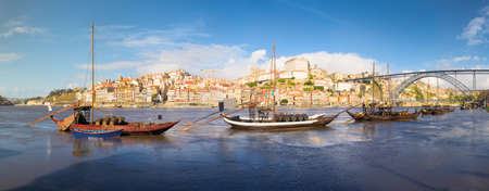 Porto old town cityscape on the Douro River with traditional Rabelo boats. Portugalの写真素材