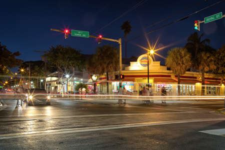 KEY WEST, FLORIDA, USA - JAN 18, 2017: Shops, bars and hotels in the twilight at Duval street in the center of Key Westのeditorial素材