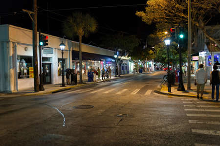 KEY WEST, FLORIDA, USA - JAN 18, 2017: Shops, bars and hotels in the twilight at Duval street in the center of Key Westのeditorial素材