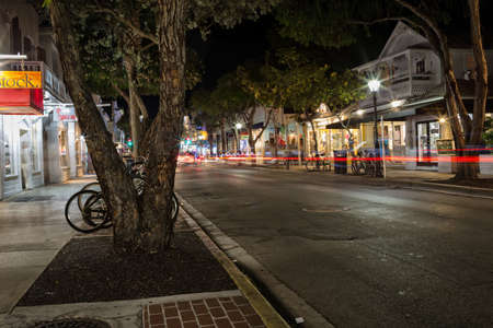 KEY WEST, FLORIDA, USA - JAN 18, 2017: Shops, bars and hotels in the twilight at Duval street in the center of Key Westのeditorial素材