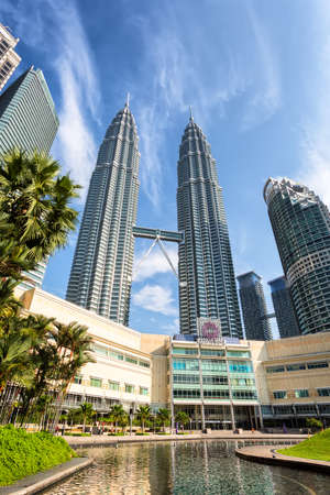 Kuala Lumpur, Malaysia - April 19, 2015: Petronas Twin towers, Kuala Lumpur central park KLCCのeditorial素材