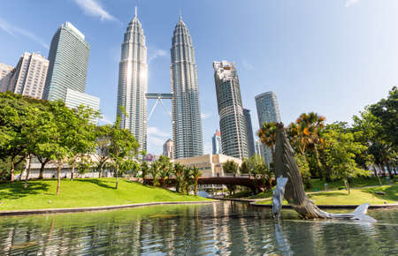 Kuala Lumpur, Malaysia - April 19, 2015: Petronas Twin towers, Kuala Lumpur central park KLCCのeditorial素材