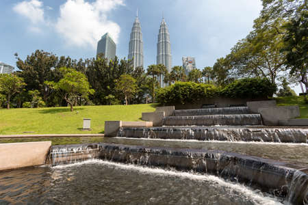 Kuala Lumpur, Malaysia - April 19, 2015: Petronas Twin towers, Kuala Lumpur central park KLCCのeditorial素材