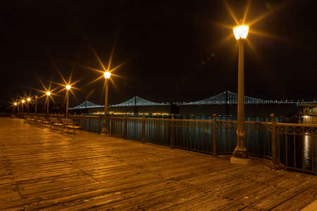 San Francisco cityscape at night from Pier 7. Night sky and city lights.の写真素材
