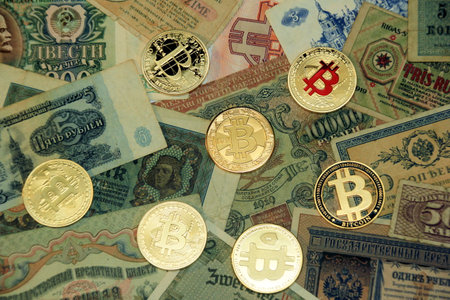 Bitcoin souvenir coins. Cryptocurrency golden bitcoin coin. Conceptual image for worldwide...