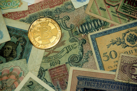 Bitcoin souvenir coins. Cryptocurrency golden bitcoin coin. Conceptual image for worldwide cryptocurrency and digital payment systemの写真素材