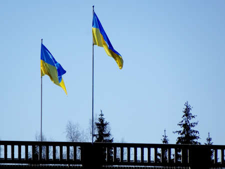 Lots of Ukrainian flags on the bridge over the river Gauja near Siguldaの写真素材