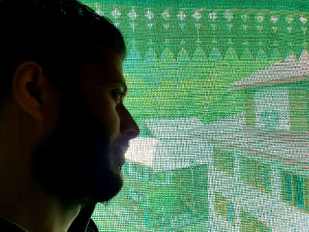 A man is sad, helpless, depressed, in tension thinks on coronavirus.Corona or cover-19 stay home...