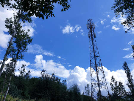 View of cloudy blue sky beautiful villages and rice fields of villagers in Indian states. Green and...