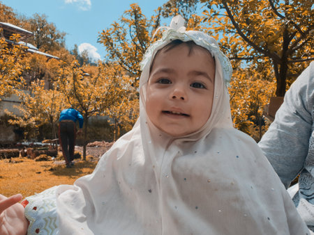 Masked students  reading and writing their school work at home during the pandemic coronavirus. Online classes are common due to covid 19.の写真素材