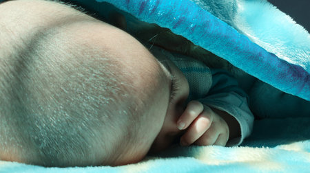 Beautiful kid different poses looks very handsome. Small child after born have soft cheeks and innocent small face with a shing smile.の写真素材