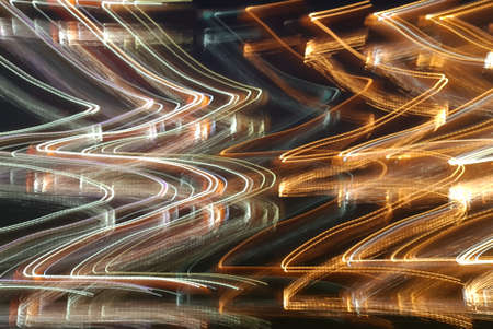 Blue, red, white and purple light painting photography, long exposure, ripples and waves against a...