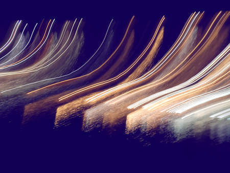 Blue, red, white and purple light painting photography, long exposure, ripples and waves against a...