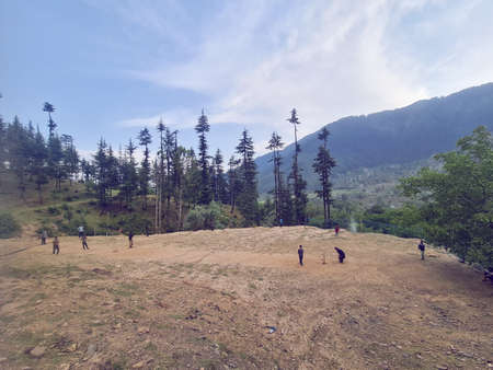 Kashmir beauty green hills forests in mountains. summer landscape with green grass on the hills....