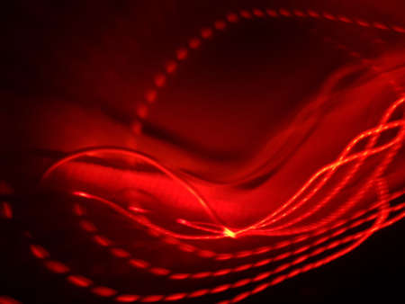 Light painting long exposure photography. Year 2022 out in multicolor red numbers against background.の写真素材