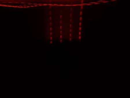 Light painting long exposure photography. Year 2022 out in multicolor red numbers against...