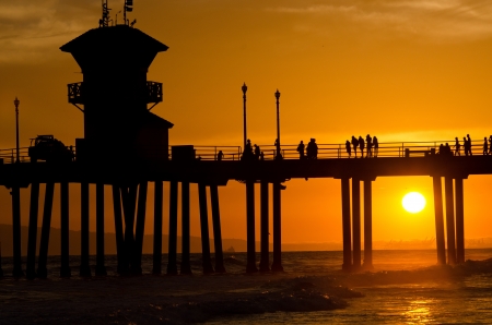 The pier in Huntington Beach, CA at sunset during a summer night の写真素材