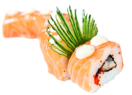 Sushi Roll with salmon, eel, caviar, cucumber and rice   Red Dragon   Isolated on whiteの写真素材