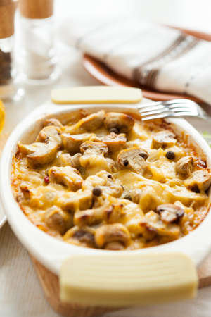 Vegetables casserole with mushrooms, potatoes and cheese on a pan  Healthy foodの写真素材