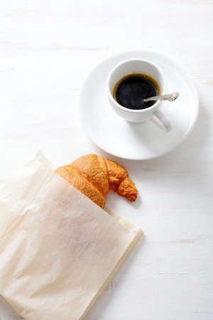 Fresh Croissant with coffee. Traditional French breakfastの写真素材