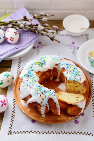 Sliced Easter cake on a napkin. Spring holiday
