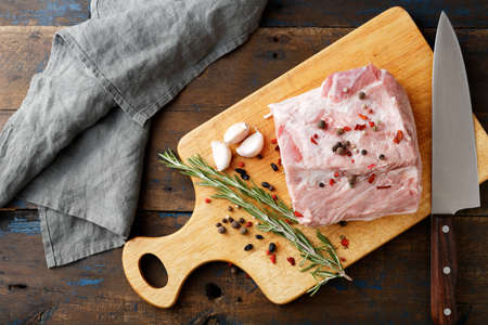 Fresh Raw Pork on wooden cutting board. Top viewの写真素材