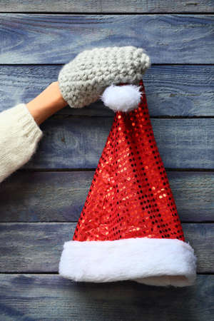 Santa hat on wooden backgroundの写真素材