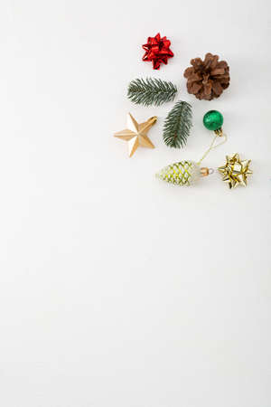 Christmas gift in hands on white surface, flat layの写真素材