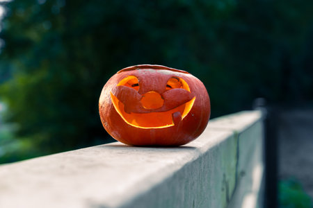 Halloween design with pumpkins. DIY Halloween pumpkins on a natural background.の写真素材