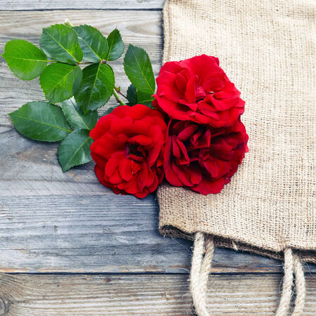 red rose on wooden backgroundの写真素材