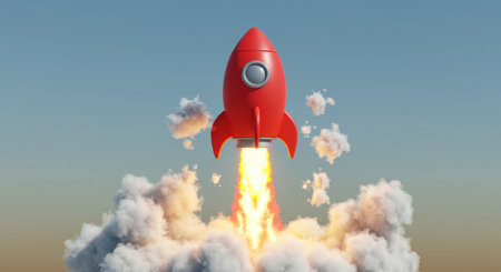 Red rocket launching into the sky with fire and smoke, representing startup, success, business growth, and ambition.の素材