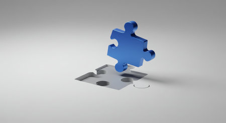 A shiny blue puzzle piece hovers above its corresponding slot in a white surface, symbolizing solution or completion.の素材