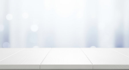 Empty white wooden table top with a soft, blurred bright background featuring gentle bokeh lights. ideal for product display, presentation, and advertising.の素材