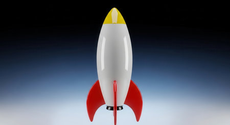 Stylized rocket with a smooth white body, vibrant red fins, and a yellow nose cone, standing upright against a gradient background. represents startup, innovation, and progress.の素材