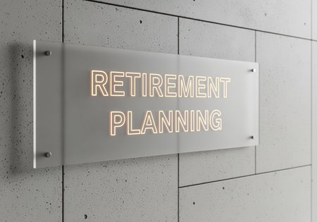 Frosted glass sign displaying glowing RETIREMENT PLANNING text mounted on a modern concrete wall, symbolizing financial foresight, future security, and investment strategies.の素材
