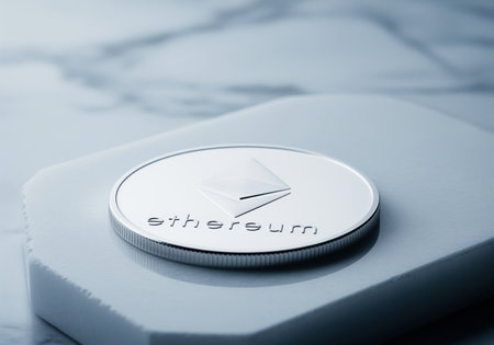 A close up view of a gleaming silver ethereum coin, showcasing its detailed design and metallic finish. this image is ideal for illustrating digital finance, blockchain technology, and cryptocurrency concepts.の素材