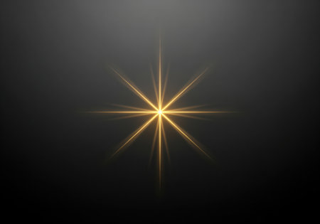 Abstract golden light effect with sharp rays centered in a dark space, symbolizing energy, magic, and illumination.の素材