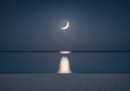Bright crescent moon reflecting a luminous path across the calm, dark water surface under a deep blue night sky, symbolizing peace, mystery, and tranquility.の素材