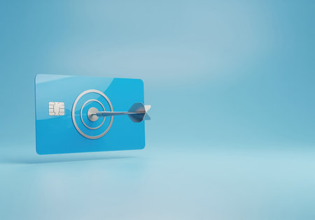 Blue credit card featuring a target symbol struck precisely by a silver dart, illustrating financial accuracy, successful marketing, and achieving payment goals.の素材
