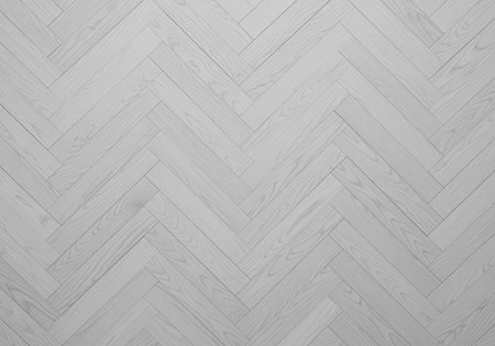 Detailed view of a modern light gray wood floor featuring a classic geometric herringbone pattern. perfect seamless texture for backgrounds and design projects.の素材