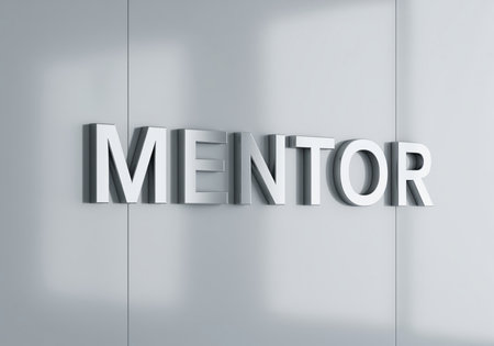 MENTOR word displayed in large, metallic, three dimensional block letters mounted on a sleek, light gray corporate wall. represents guidance, leadership, training, and professional development.の素材