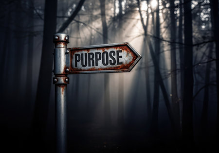 Rustic metallic signpost with the word 'PURPOSE' pointing right, standing in a dark and misty forest illuminated by ethereal sunbeams. Represents direction, life path, meaning, and a journey into the unknown.の素材