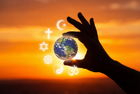 A silhouetted hand holds a glowing earth globe surrounded by diverse religious symbols including christianity islam judaism buddhism taoism and hinduism against a vibrant sunset sky symbolizing global peace and spiritual harmony.の素材