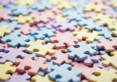 A vibrant close-up captures a dense and cohesive arrangement of colorful puzzle pieces, filling the entire frame with pastel hues, symbolizing problem-solving, collaboration, and creativityの素材